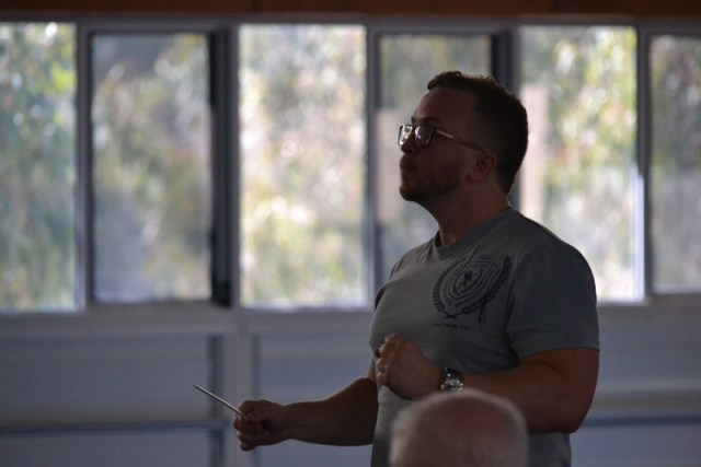 Adam Conducting